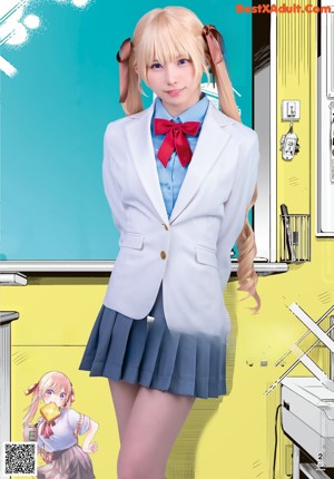 A woman in a pink sweater and blue skirt posing for a picture.